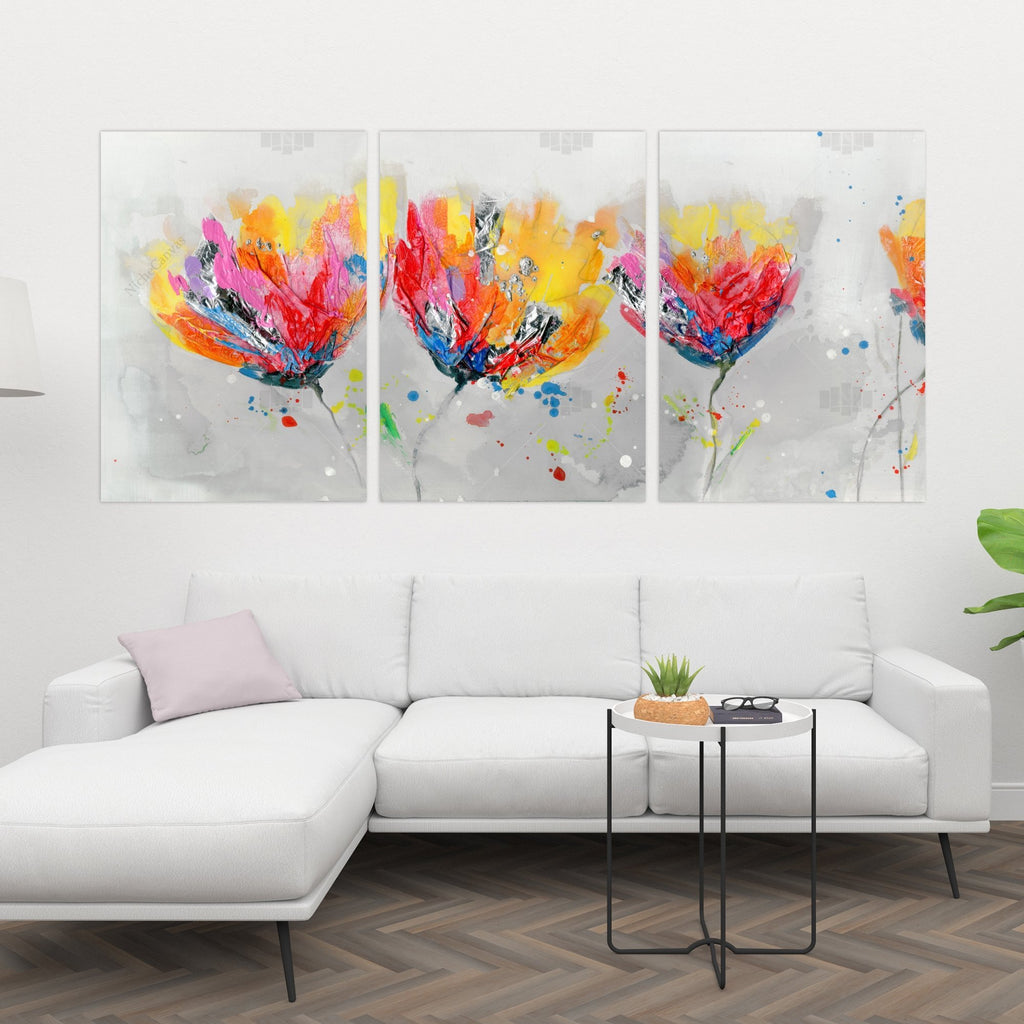 Four Colored Flowers On Gray Background